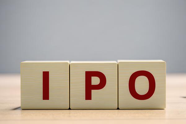 Download image of the word 'IPO' printed in bold letters on a wooden Dice Cube, representing the concept of an initial public offering.-banrupi